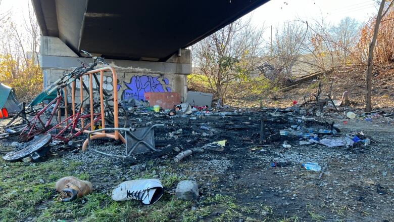 Shoes and debris and ashes can be seen following an early morning fire in Halifax on Tuesday. 