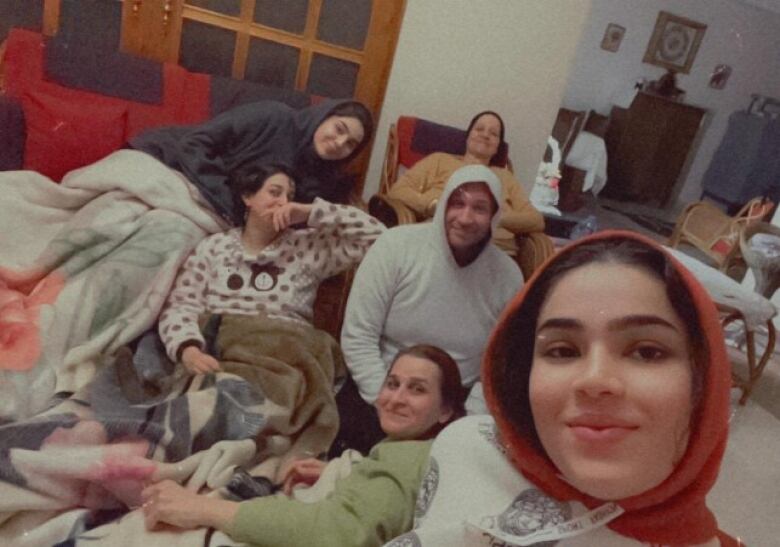 Nasser Najjar with his family at their home in Gaza in February. The house has since been destroyed.