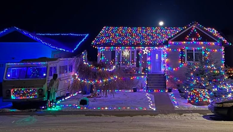 A house decked out in Christmas lights. 