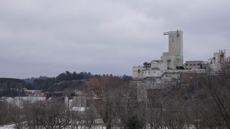 A mill next to a river.