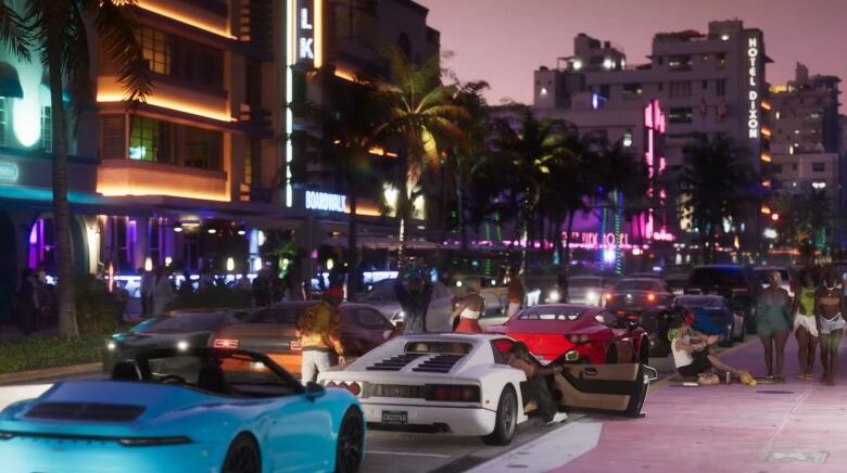 Video game screenshot of people in Miami with neon club lights, palm trees and expensive sports cars lining the roads.