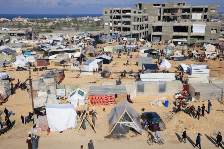 Displaced Palestinians are seen sheltering in Rafah, in the southern Gaza Strip, amid fighting between Israel and Hamas.