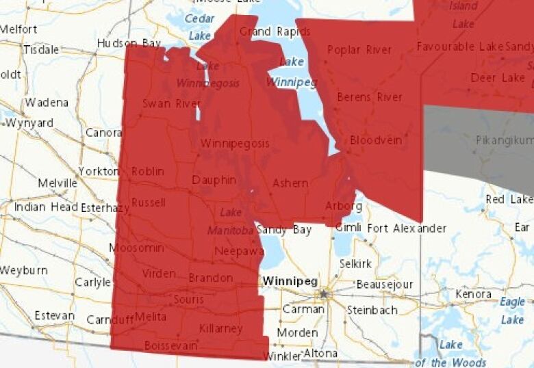 A map of Manitoba is highlighted in red areas that are under a snowfall warning.