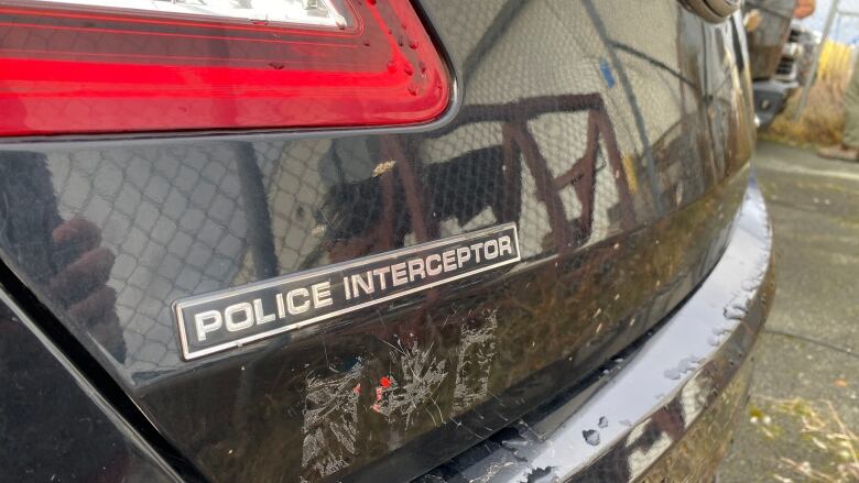 A decommissioned police vehicle for sale at public auction at a CBRM tax sale.