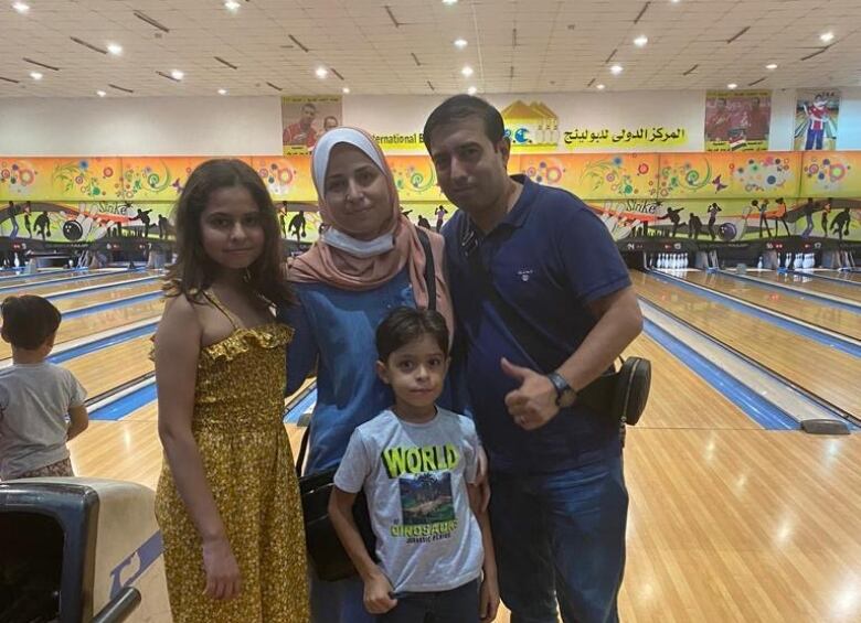 Nael Alhalis (right) with his wife Enas Alhalis and their children Layan (left) and Kareem in an undated photo.