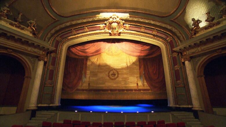 A cinema stage is empty.