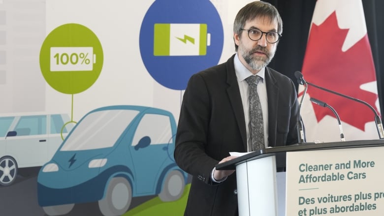 Environment Minister Steven Guilbeault speaks at an announcement in Toronto on Tuesday, Dec.19, 2023, where he outlined the details of his plan to eventually phase out the sale of gas-powered vehicles in Canada.