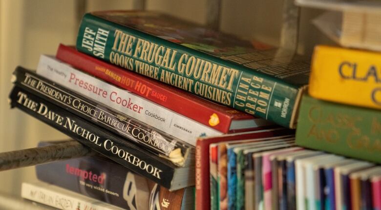 A photo of cookbooks about making inexpensive meals.