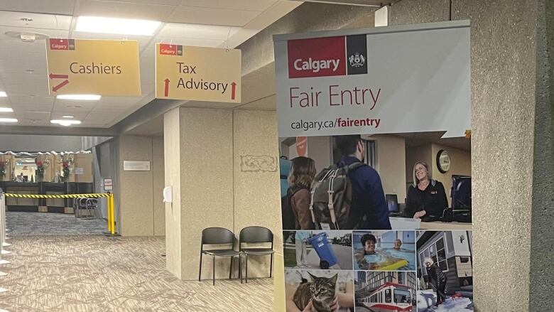 A sign marks the entrance to city support program.