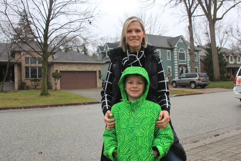 A boy and his mother. 