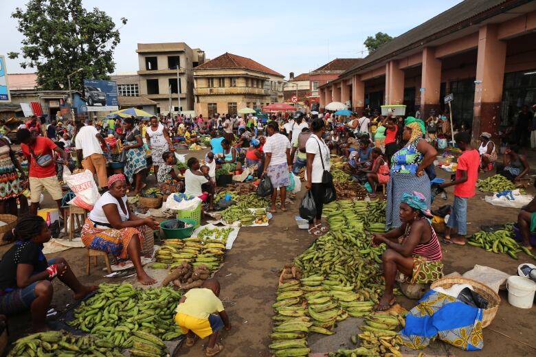 A lot of people selling or buying food