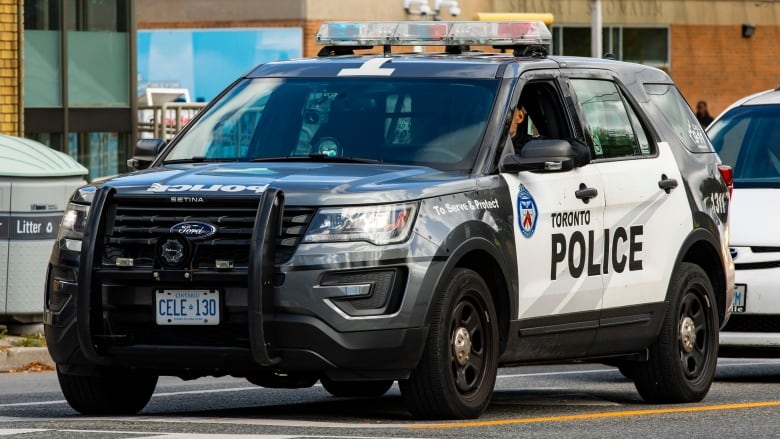 A Toronto Police cruiser at on Glencairn Avenue crossing Bathurst Street on October 12, 2023.