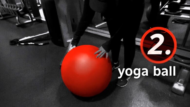 A yoga ball inside a gym with red text reading, 