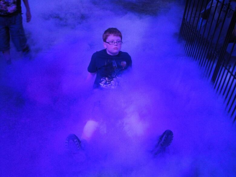 An 8-year-old Levi Day mimicking his favourite wrestler, The Undertaker, at WrestleMania 26.