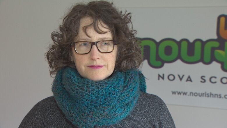 Lisa Roberts stands at Nourish headquarters in Dartmouth, N.S.