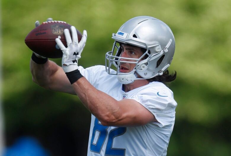 Detroit Lions tight end Luke Willson catches a pass during practice at the NFL football team's training camp in Allen Park, Mich., Wednesday, June 6, 2018. 