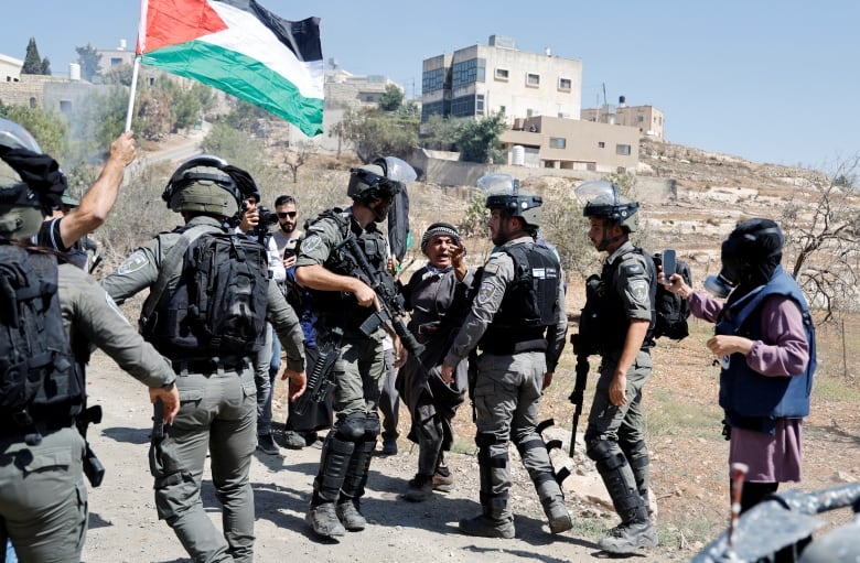 Palestinians react during a protest against Israeli settlements near Nablus in the Israeli-occupied West Bank September 15, 2023.