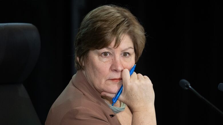 Commissioner Justice Marie-Josee Hogue listens to counsel deliver remarks on the second day of the Public Inquiry Into Foreign Interference in Federal Electoral Processes and Democratic Institutions, Tuesday, Jan.30, 2024 in Ottawa. 