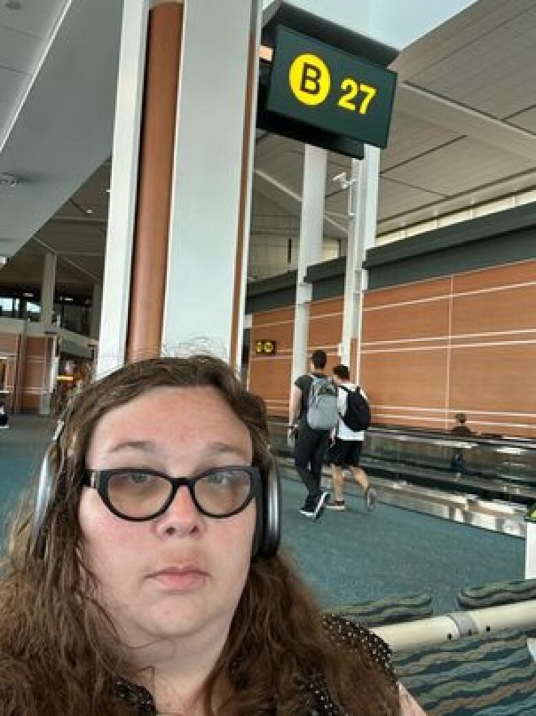 Daria Bloodworth at Vancouver's airport on her way to federal court proceedings.