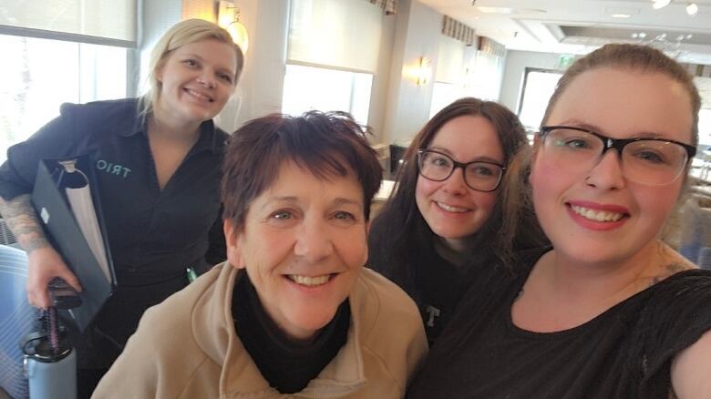 Simon Hotel restaurant staff Andrea Wadden, Vivienne Clark, Sara Luskey and Cassie Miles stayed at the hotel through the storm to help keep guests fed.