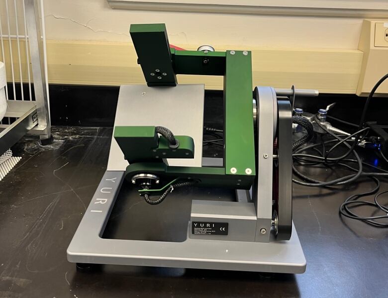 A device used for scientific research is shown on a counter.