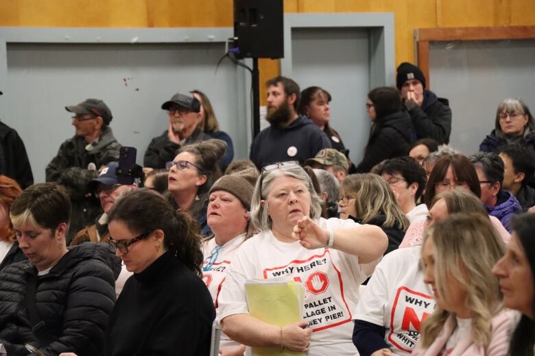 People at a meeting in Whitney Pier upset over a proposed shelter village. 