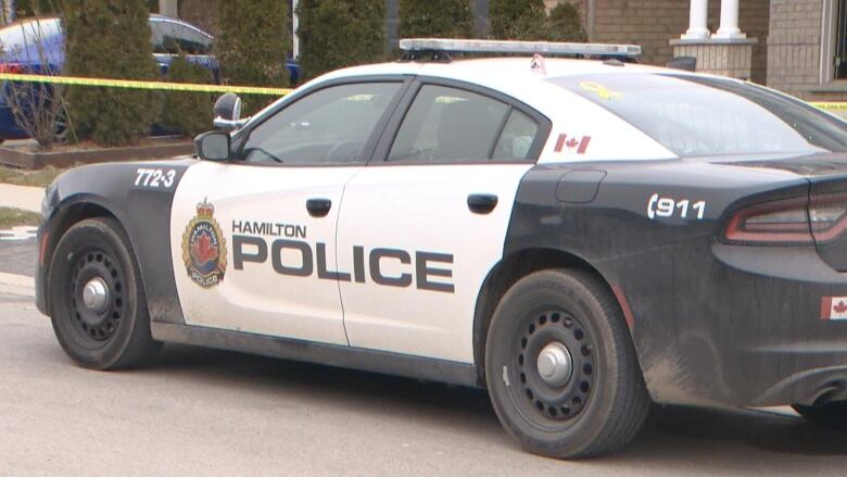 Hamilton police say they have charged the 22-year-old son of a man killed in Stoney Creek on Saturday with his murder.