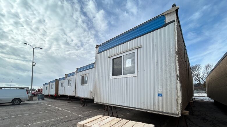 Modular units which will make up the community outreach centre sit in a parkinglot off Park Street.