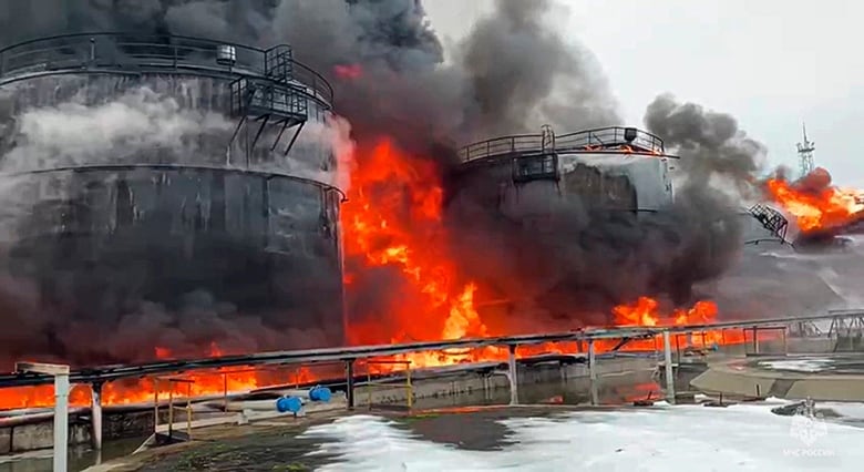 A photo from Bryansk Gov. Alexander Bogomaz's Telegram channel shows oil tanks on fire after a drone attack in Klintsy, Russia.