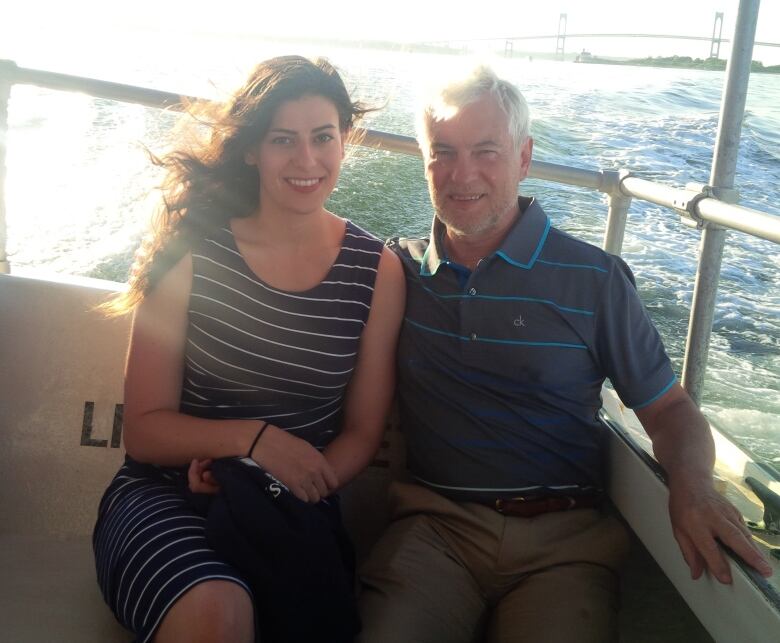 man and woman on boat