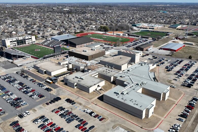 A school is shown from an aerial view.