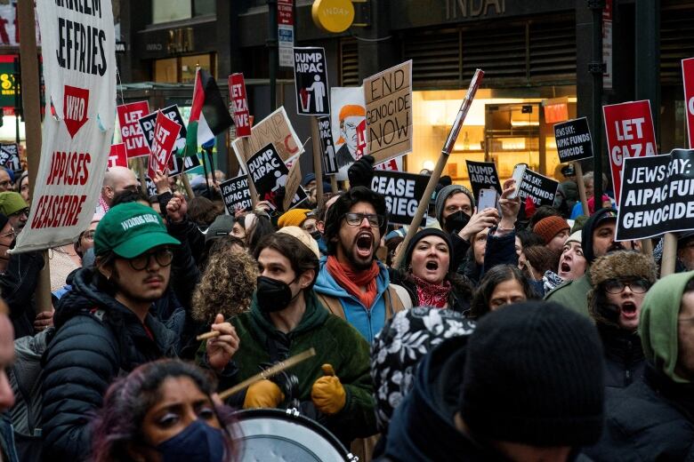 Protesters shout slogans as they march demanding a ceasefire and the end of Israel's attacks on Gaza, in New York City, U.S., February 22, 2024