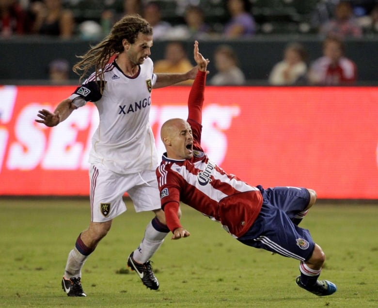 Men playing soccer