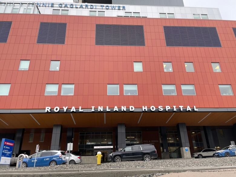 Front of a red building with a sign that reads Royal Inland Hospital