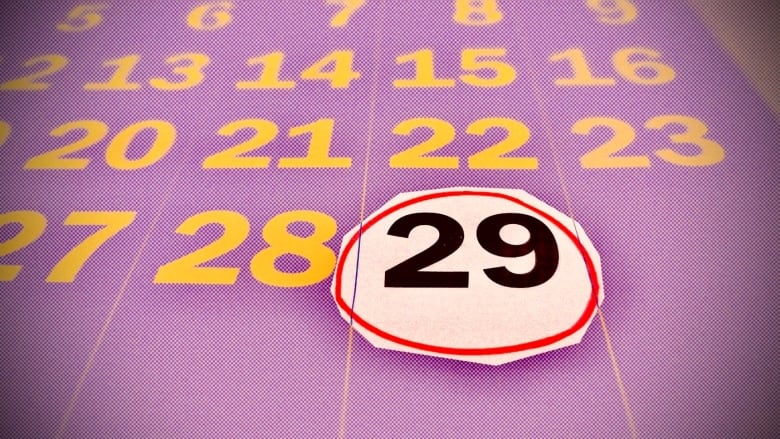 The number 29 is circled in red on an illustration of a calendar. 