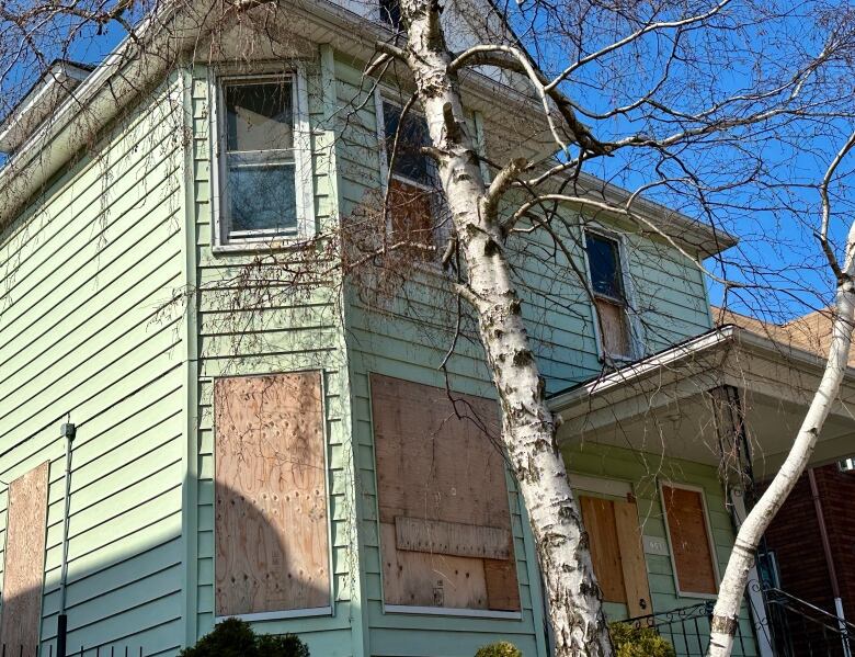 A large house in disrepair.