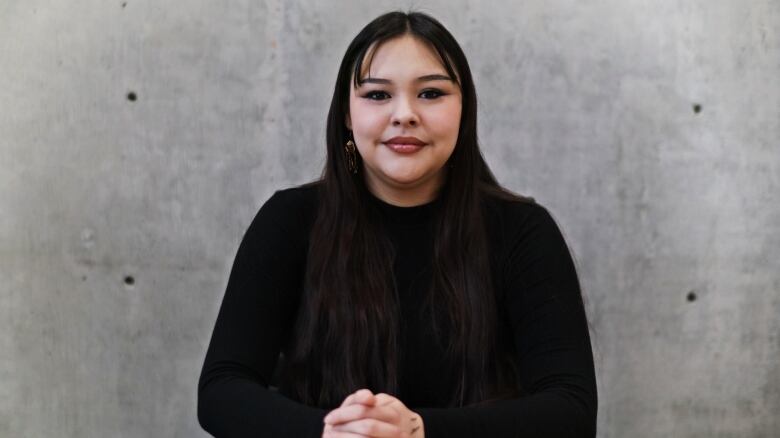 North Central Strong youth task force member Hope Henderson sits in a conference room in Regina's mmawyatitn centre.