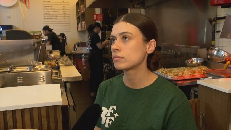 Elyse Moriarty, general manager at Burgers 'N Fries Forever in downtown Toronto, says: 'It's definitely a good idea. At the end of the day, any little changes that we can do will be positive for the environment.'