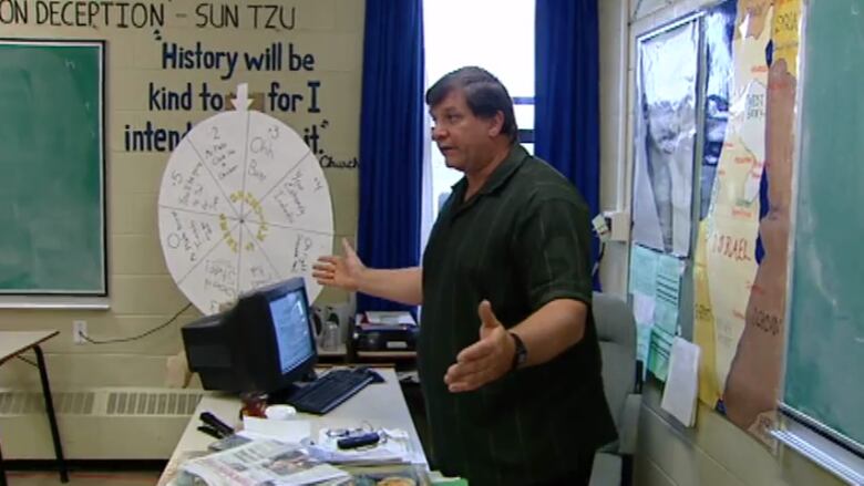 Rick Plato speaks to his students at Charles P. Allen high school in this file photo from 2009. 