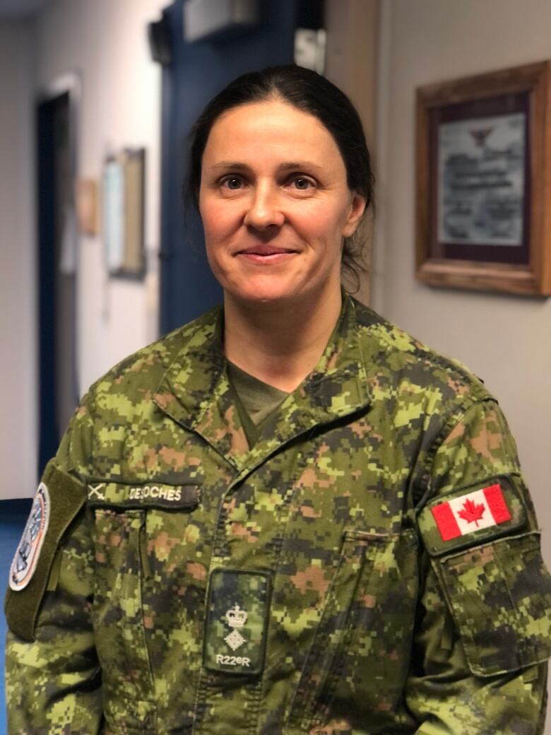 A woman in a military uniform. 