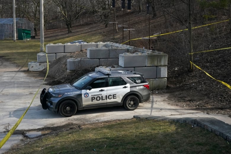 The scene where two police officers were injured while chasing a shooting suspect is pictured in Toronto, Tuesday, March 12, 2024. THE CANADIAN PRESS/Arlyn McAdorey