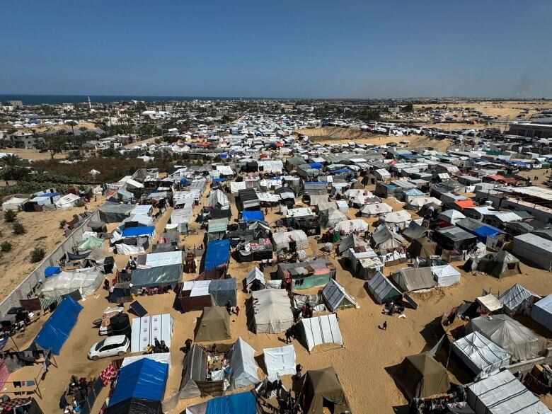 Displaced Palestinians, who fled their houses due to Israeli strikes, shelter in a tent camp, amid the ongoing conflict between Israel and the Palestinian Islamist group Hamas, in Rafah, in the southern Gaza Strip March 11, 2024. 