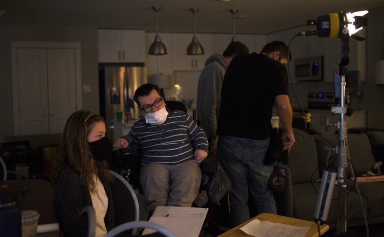 Vera Dunlop-Vaillancourt (left) shadows Spencer Mackay on the set of a film.