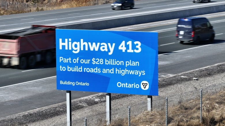 A picture of a Highway 413 billboard from the Ontario government that reads 