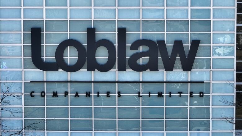 A drone picture of a large company sign reading 'LOBLAW Companies Limited'.