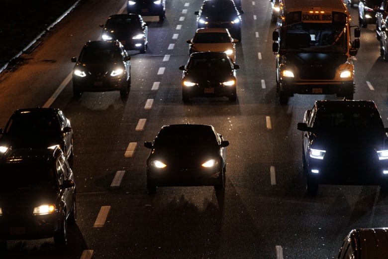 Cars in afternoon rush hour traffic jam.