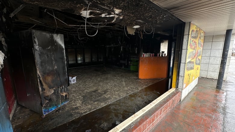 The inside of a store that caught fire.