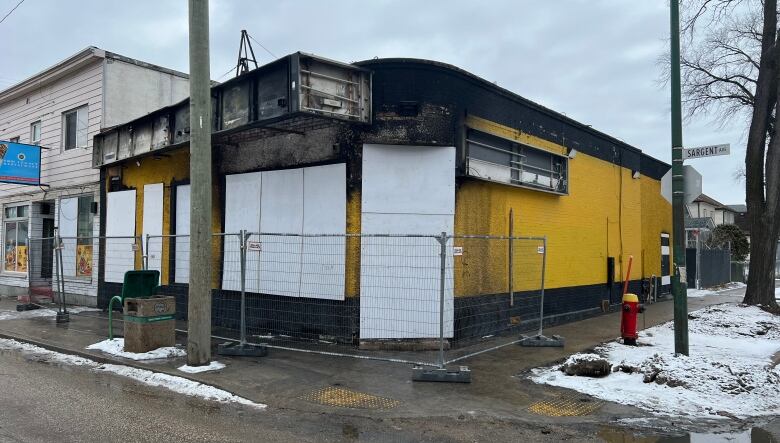 A building showing some burn damage.