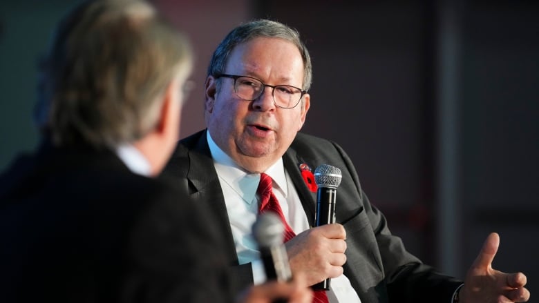 U.S. Ambassador to Canada David Cohen takes part in an armchair discussion with President and CEO at Canadian Manufacturers and Exporters Dennis Darby during the 2023 National Manufacturing Conference in Ottawa on Tuesday, Nov. 7, 2023.