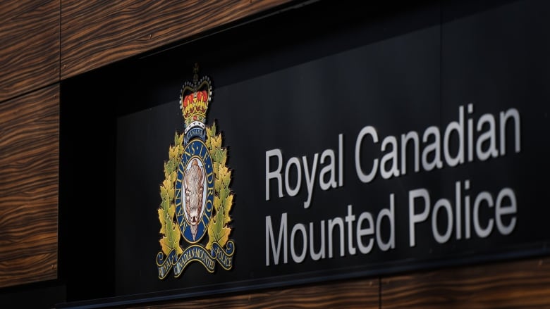 The RCMP logo is seen outside the force's 'E' division headquarters in Surrey, B.C., on Thursday, March 16, 2023. 